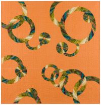 Its a Jungle out There Jungle print fabric is used to create the rings on a muted orange background